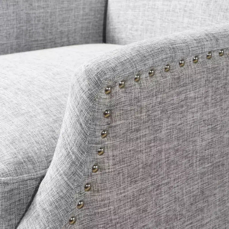 Fauteuil inclinable contemporain en tissu avec oreilles, système push-back et clous décoratifs