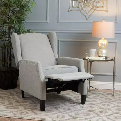Fauteuil inclinable contemporain en tissu avec oreilles, système push-back et clous décoratifs