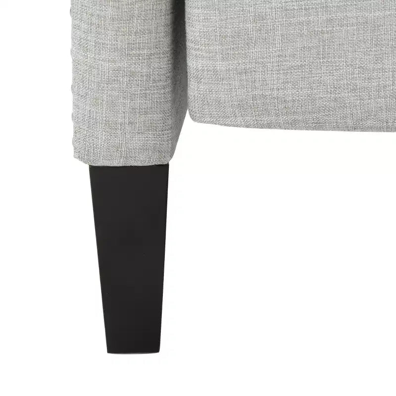 Fauteuil inclinable contemporain en tissu avec oreilles, système push-back et clous décoratifs