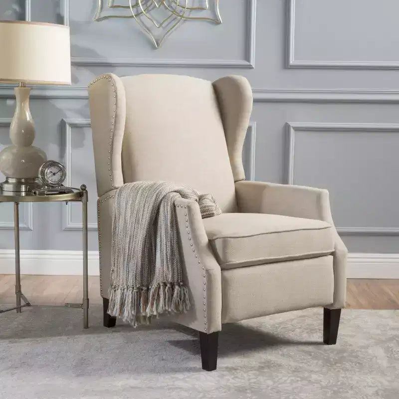 Fauteuil inclinable contemporain en tissu avec oreilles, système push-back et clous décoratifs